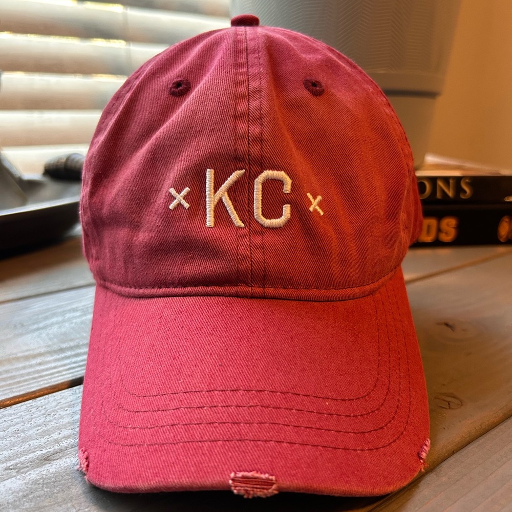 Made The signature xKCx in burgundy